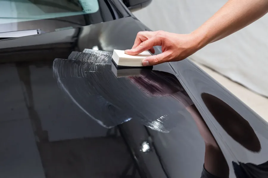 Protection Film Being Installed On Automotive Glass
